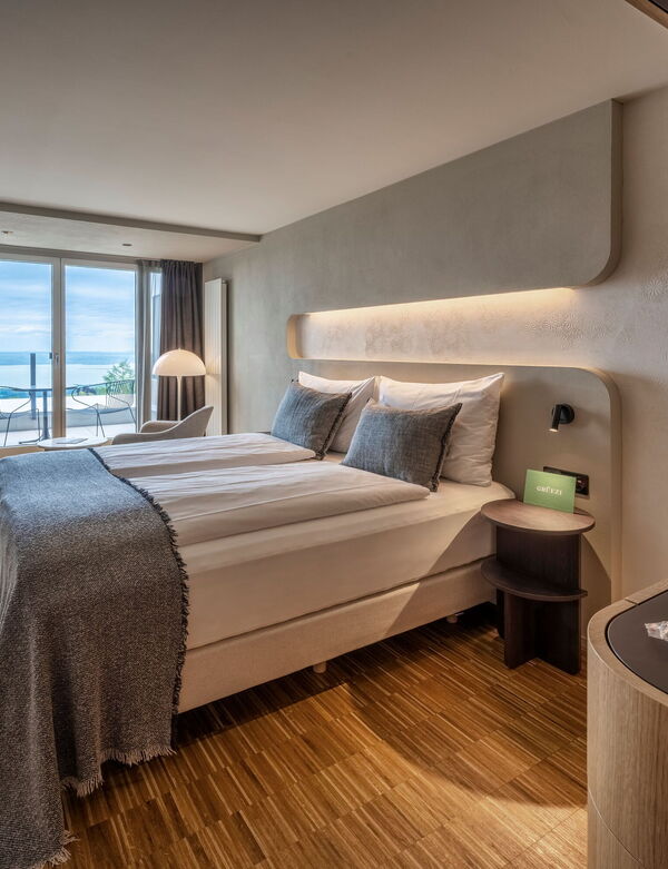 Interior view of hotel room with balcony